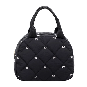 Sac à main matelassé noir portable avec broderie nœud blanc et fermeture éclair dorée