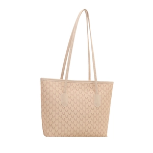 Elegant beige monogram tote bag with repeating M pattern and slim shoulder straps
