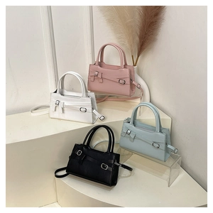 Collection of stylish bow-knot flap bags in pink white black and light blue colors