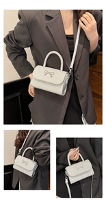 Detailed views of a silver glitter bow crossbody bag styled with a grey blazer outfit