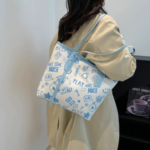 Minimalist graffiti print tote bag with blue straps and large capacity for women