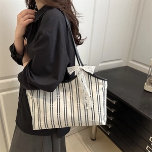 Striped canvas tote bag with lace bow and black straps for women daily commute