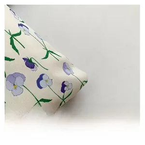 Detail of floral tote bag showing high-quality canvas fabric with pansy flower patterns