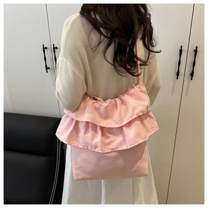 Pink ruffle canvas tote bag back view showing large capacity and soft pleated texture
