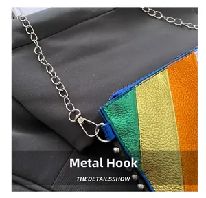 Close-up of rainbow leather patchwork with high-quality metal chain and hardware hook
