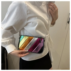 Close-up of rainbow metallic leather phone bag with silver beaded trim and chain strap