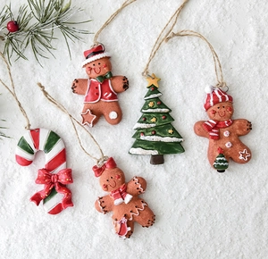 Detailed set of 5 resin Christmas ornaments with gingerbread men, tree and candy cane