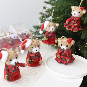 Handmade straw Christmas bear set in festive plaid outfits and holiday gift packaging