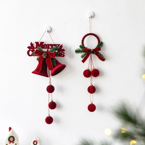 Flocked red Christmas bell ornaments with Merry Christmas greeting and pine cone accents