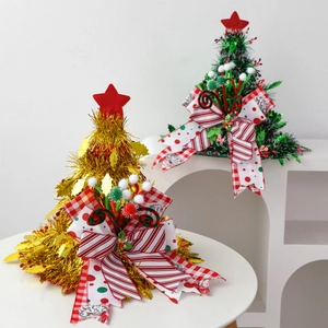 Sparkly gold and green Christmas tree hat toppers with red stars and festive bows