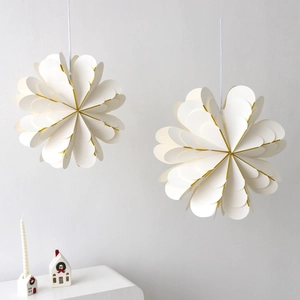 Hanging 3D paper heart star ornaments with gold foil edges for Christmas tree decoration