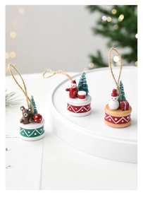 Three-piece set of mini Christmas pendants featuring Santa, a bear, and a snowman on drums