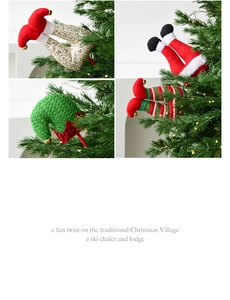 Detailed view of Christmas elf hats and legs tree toppers with sequins and plush fabric