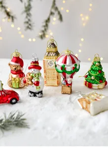 Macro detail of hand-painted Christmas glass ornaments including snowman and festive bear