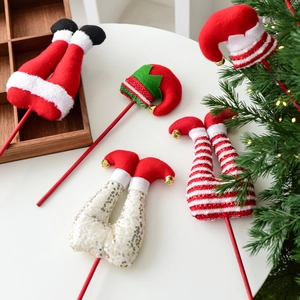 Christmas elf legs and hat tree picks set with festive red and white velvet decorations