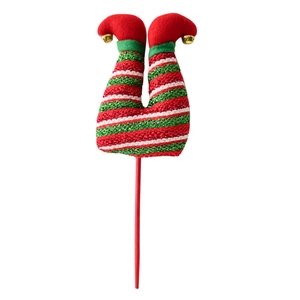 Christmas elf leg stakes featuring red and green striped knit fabric with golden bells