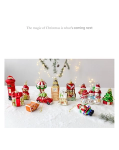Close-up of hand-painted glass Christmas ornaments including Santa and nutcracker