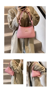 Three-way view of pink textured underarm bag with gold metal bar and woven rope handle