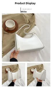 Detailed views of a white crescent underarm bag with smooth leather and gold hardware