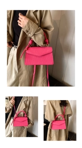 Three views of rose red mini handbag with cross pattern texture and knot handle detail