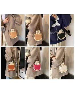 Collage of mini bucket bags with pearl handles and chain straps in multiple colors