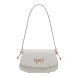 Chic cream-white matte leather crossbody bag with a polished gold bow metal ornament