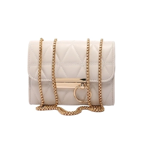 Chic cream quilted crossbody bag with golden chain strap and minimalist metal buckle