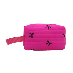 Gesteppte Kosmetiktasche aus pinkfarbenem Nylon mit schwarzen Schleifen und Seitengriff