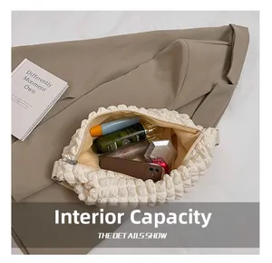 Close-up of cream popcorn texture tote bag interior showing large storage capacity