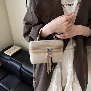 Beige canvas and khaki leather box crossbody bag with tassels and top handle for women
