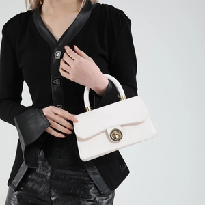 Elegant white square top handle handbag with golden circular clasp for women