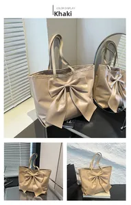 Détail du grand sac cabas kaki avec décoration nœud et doubles bandoulières
