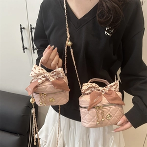 Mini quilted pink leather vanity bag with leopard bow and gold chain strap for women