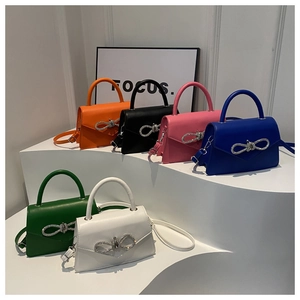 Fashionable minimalist crossbody bags with crystal bow buckle in six vibrant colors