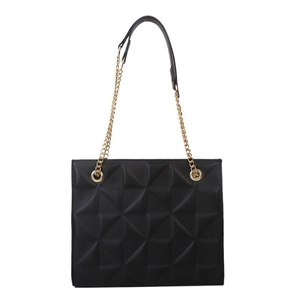 Chic black tote bag featuring geometric quilted texture and gold metal chain strap