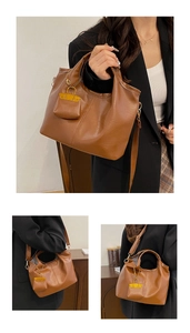 Brown retro PU leather tote bag details showing detachable strap and mini pouch charm