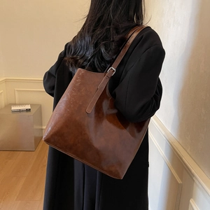Large dark brown tote bag in oil wax leather style, stylish commute shoulder bag for women