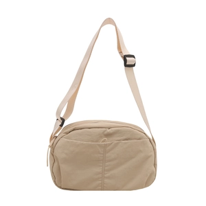 Versatile khaki nylon crossbody bag with adjustable shoulder strap for daily commuting