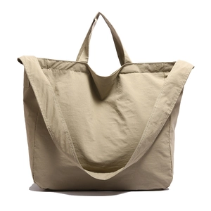 Minimalist khaki canvas tote bag with large capacity for women's casual shoulder use