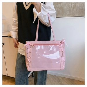 Borsa tote rosa capiente con fiocchi in nastro e tasca frontale in PVC trasparente