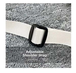 Detail of adjustable white nylon strap with black plastic buckle for shoulder bags