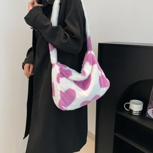 Plush heart tote bag with faux fur texture in white and purple for autumn winter styles