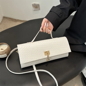 Women's Retro Woven Texture Baguette Bag Elegant Synthetic Leather Crossbody Shoulder Bag With Gold Metal Lock Chain Pendant