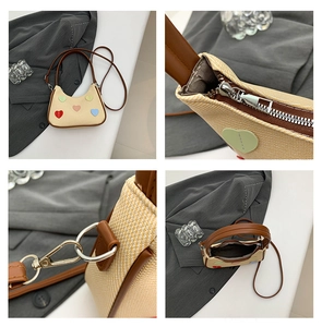 Détails du sac à bandoulière tissé avec patchs de cœur, fermeture éclair et finitions