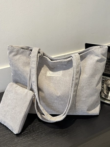 Grey striped corduroy tote bag set with matching pouch for daily commute use