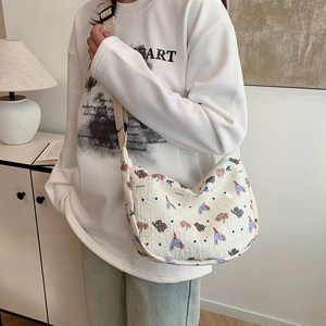 White pleated crossbody bag with cartoon elephant print and adjustable strap for women
