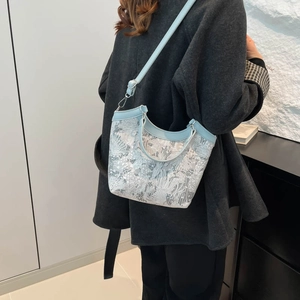Elegant light blue silk embroidery bucket bag with floral patterns for women