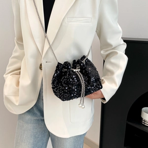 Fashionable black sequin bucket bag with pearl drawstring and silver chain strap for women