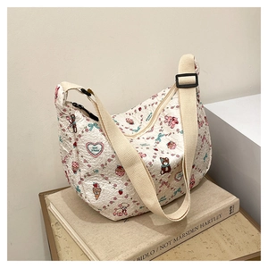 Close-up of white waffle texture tote bag with pink bear and strawberry patterns