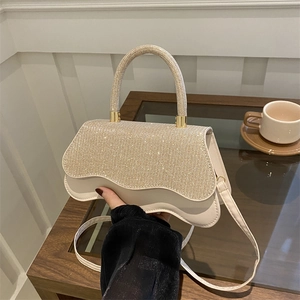 Chic cream leather handbag with sparkling rhinestone flap and wave edge design for women